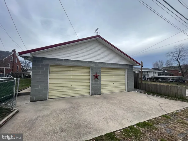 a view of a house with a garage