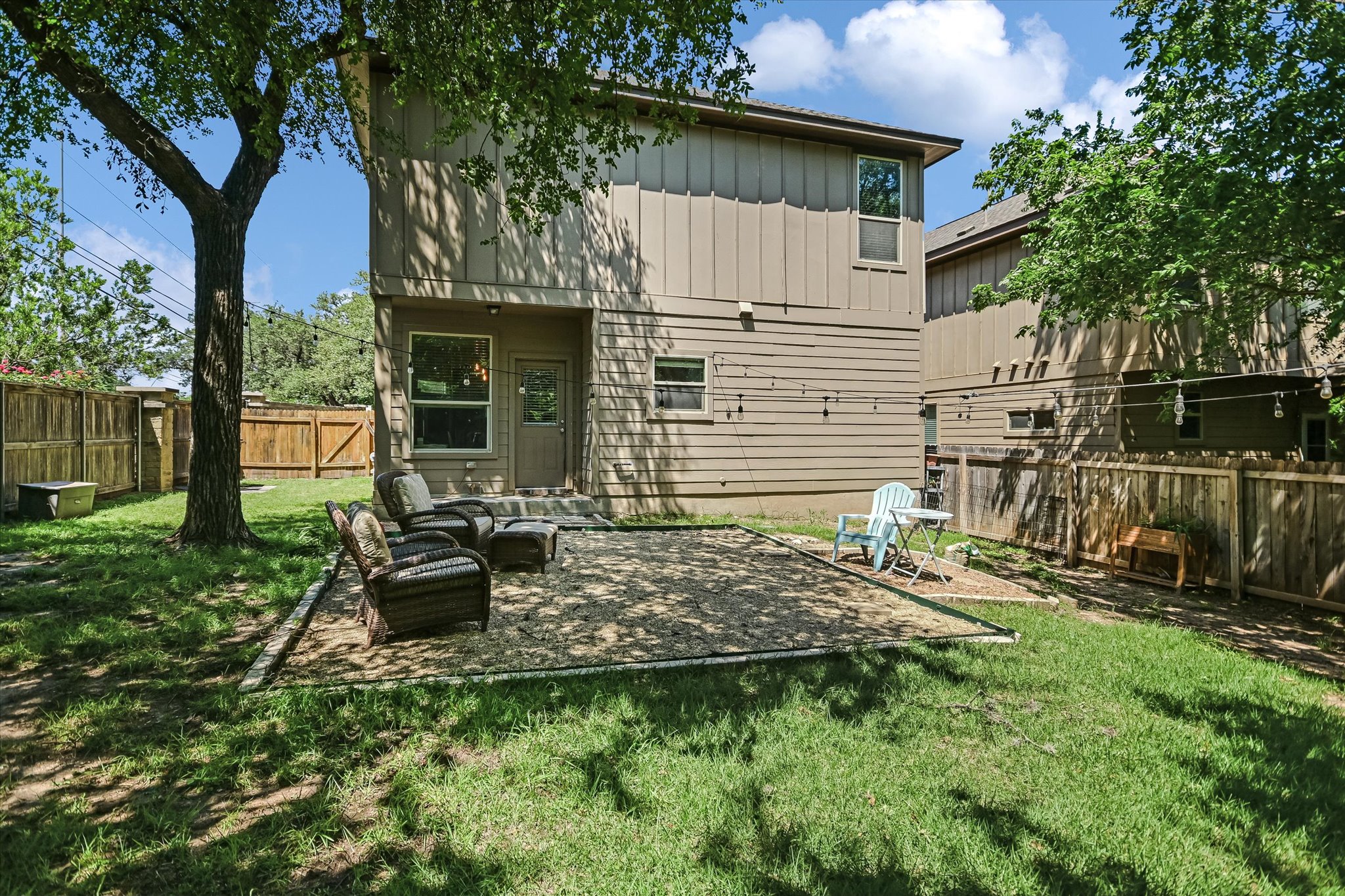 7709 Menchaca Road, Unit 1 Austin, TX 78745 - Photo 3 of 29 Large, spacious fenced backyard not common with detached condos and on a corner lot with a neighbor just on one side making this one of the most private lots in the community!