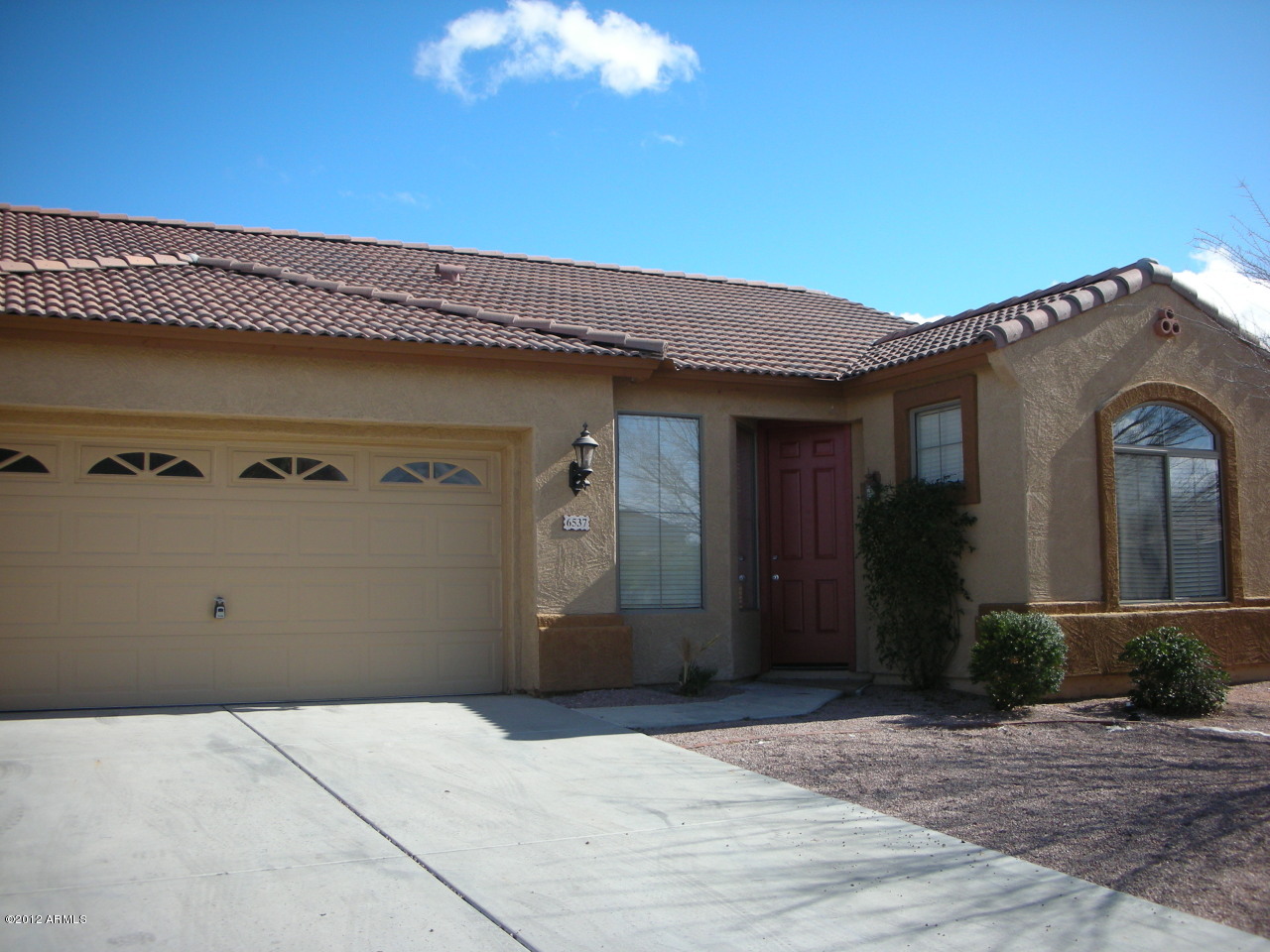 6537 South 15th Drive Phoenix, AZ 85041 - Photo 1 of 7 a front view of a house