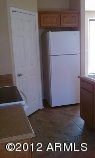 6537 South 15th Drive Phoenix, AZ 85041 - Photo 2 of 7 a view of a refrigerator in kitchen