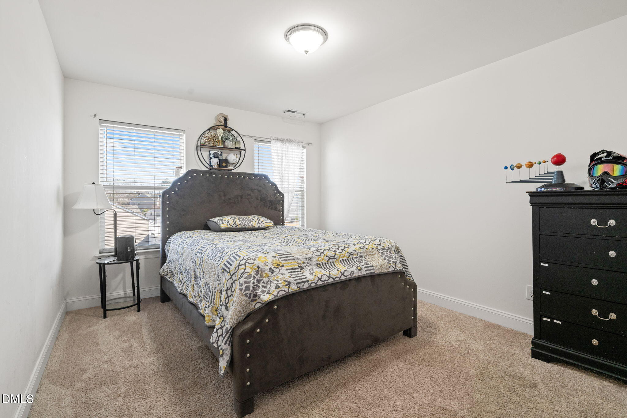 94 Combine Trail Benson, NC 27504 - Photo 33 of 43 a bedroom with a bed and a dresser