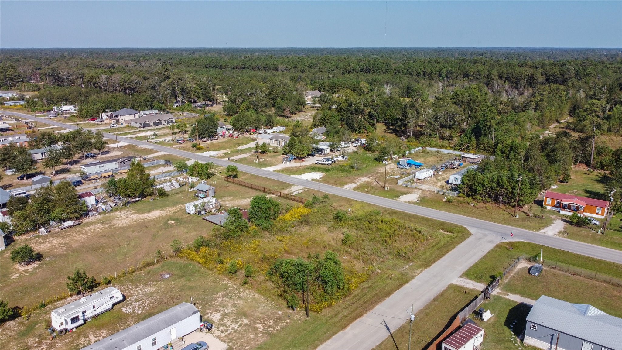 346 County Road 3550 Cleveland, TX 77327 - Photo 10 of 14 Conceptual renderings of potential commercial or residential projects that could be built on the lot.
