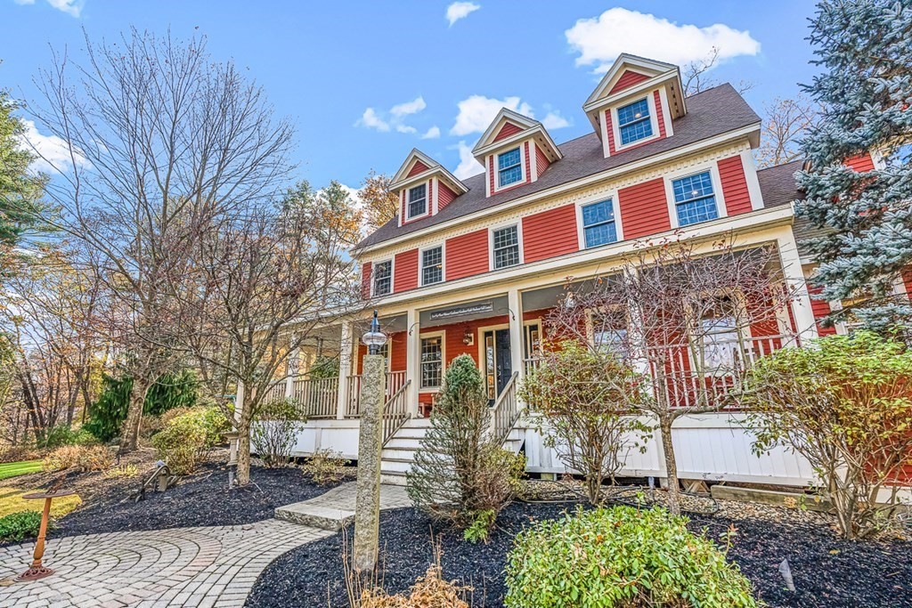 140 Forest Street Middleton, MA 01949 - Photo 1 of 32 a front view of a house with a garden