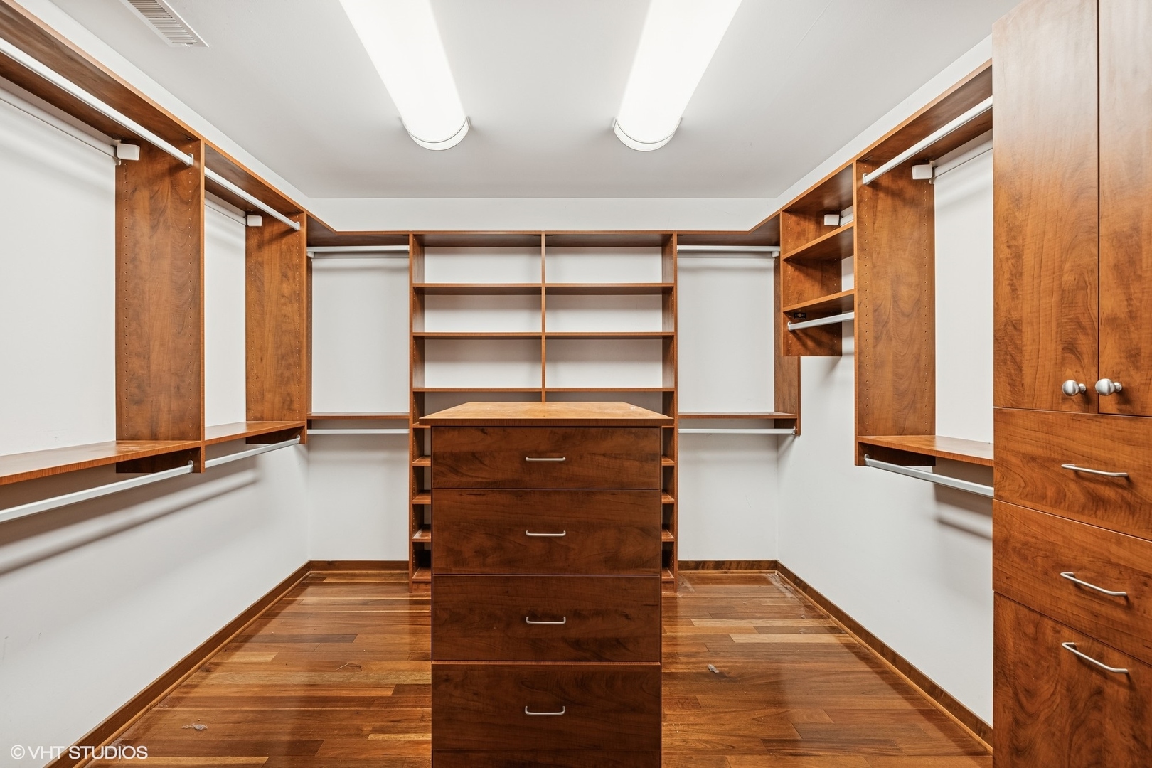 4901 Hill Road Richmond, IL 60071 - Photo 11 of 36 a view of walk in closet with clothes and shoes