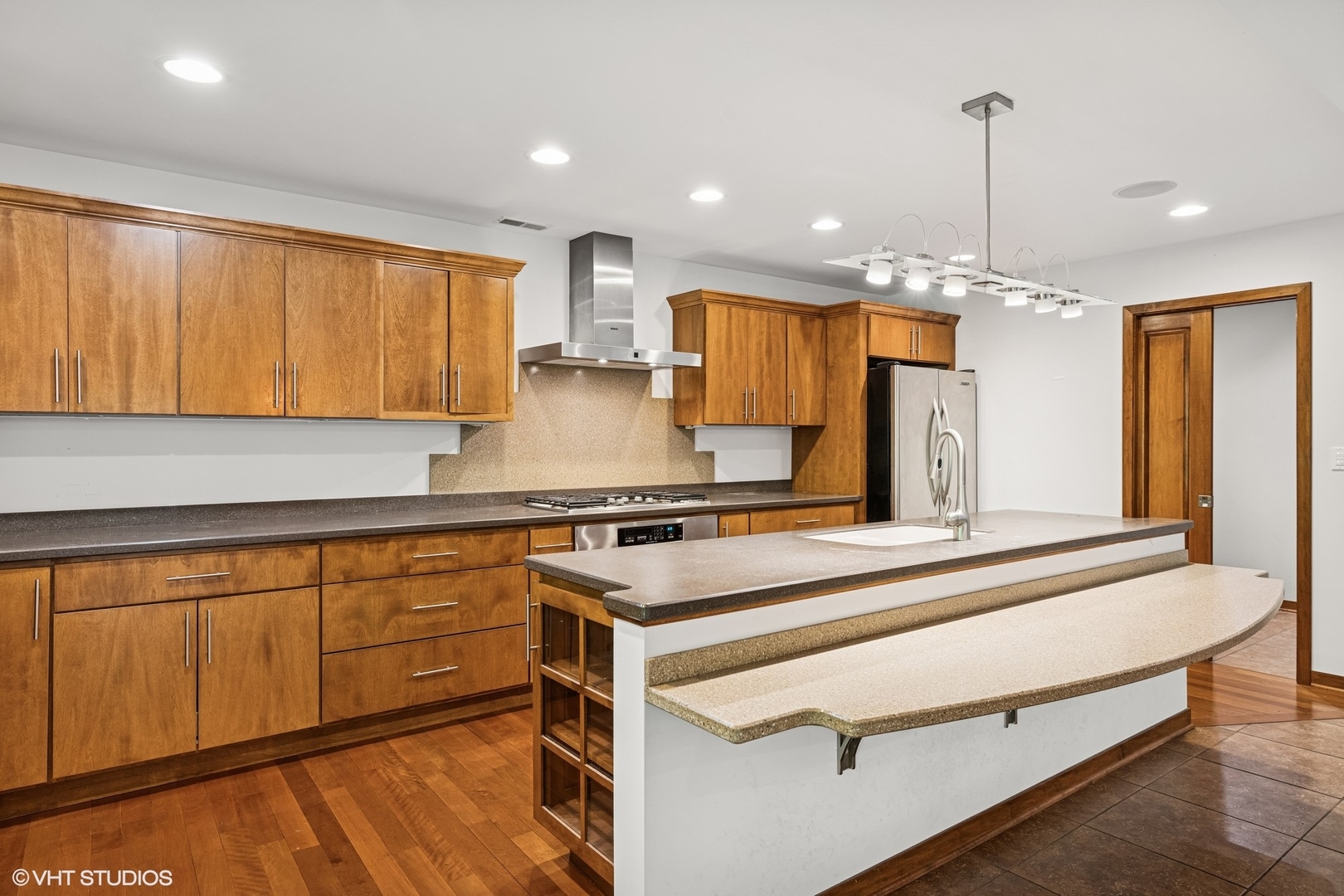 4901 Hill Road Richmond, IL 60071 - Photo 8 of 36 a kitchen with stainless steel appliances granite countertop a sink a stove and a refrigerator