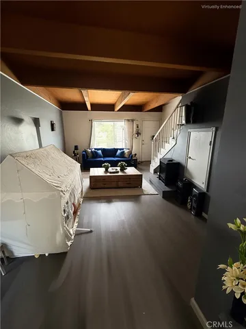 a bedroom with bed and a window