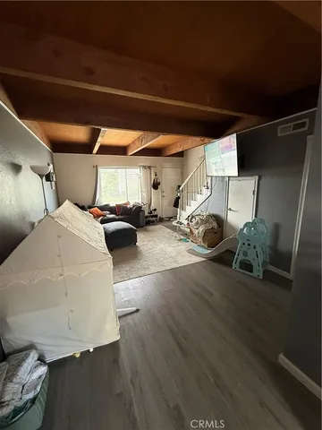 a view of parking garage with cars