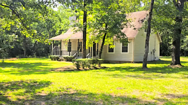 a view of a house with swimming pool