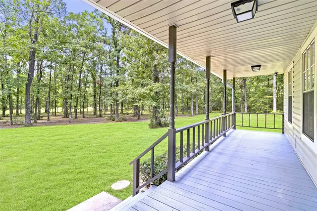 a view of a porch with a garden