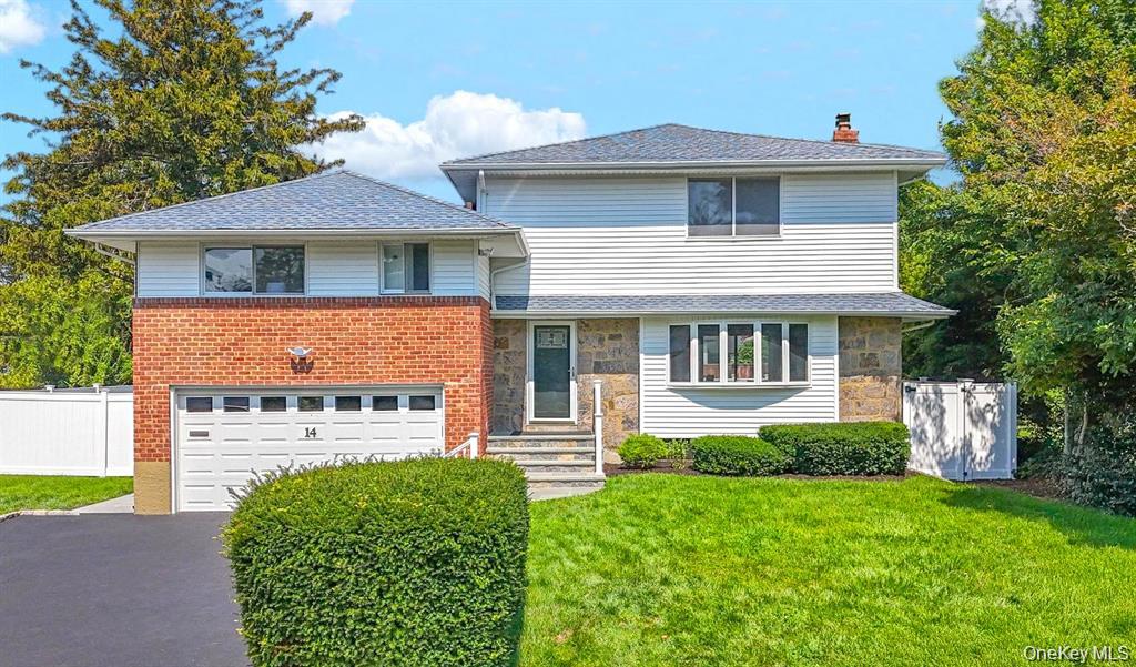 14 Westminster Road Syosset, NY 11791 - Photo 1 of 1 a front view of a house with garden