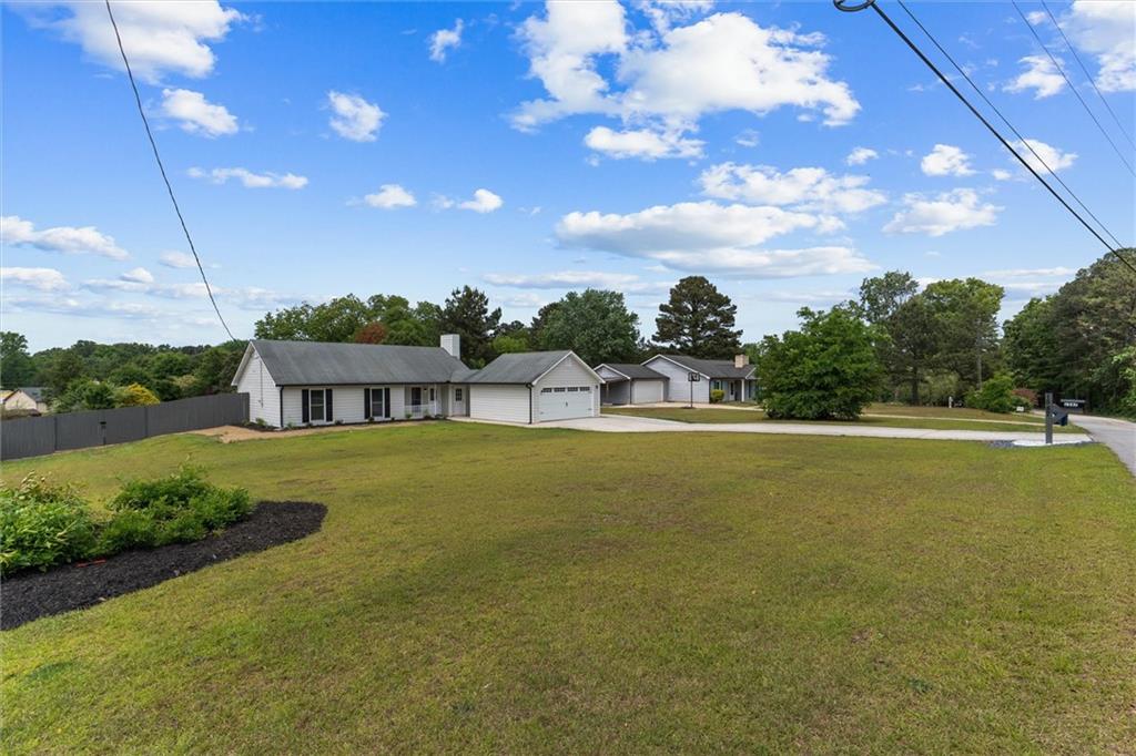 1587 Cronic Town Road Auburn, GA 30011 - Photo 6 of 56