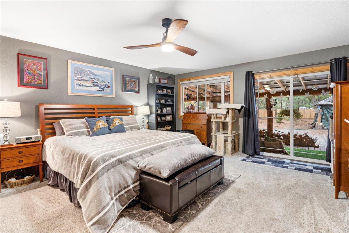 1735 Rector Road La Pine, OR 97739 - Photo 17 of 40 Primary Bed with Slider to Back Deck