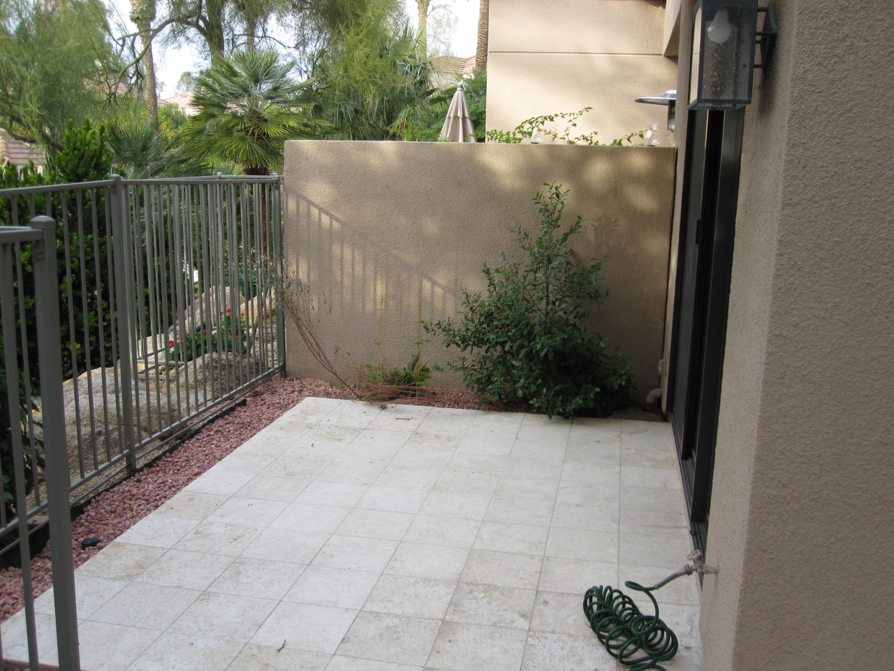 7222 East Gainey Ranch Road, Unit 109 Scottsdale, AZ 85258 - Photo 14 of 14 Exterior patio with views of the pool