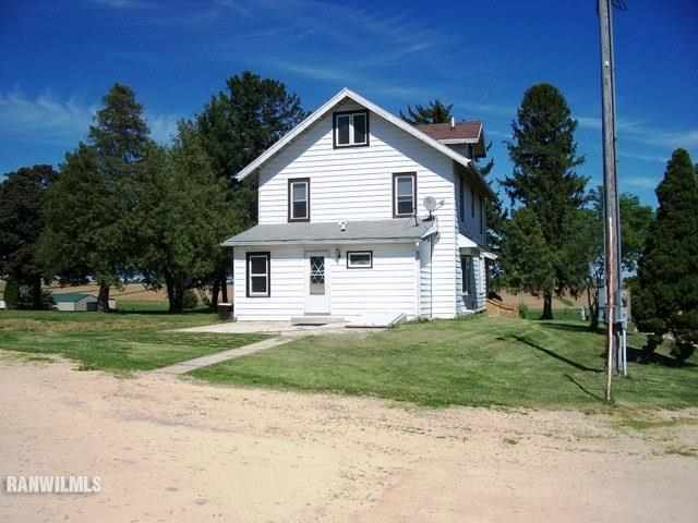 1754 North Henderson Road Freeport, IL 61032 - Photo 11 of 12 a front view of a house with a yard