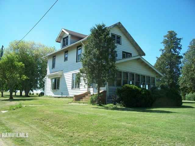 1754 North Henderson Road Freeport, IL 61032 - Photo 10 of 12 a front view of a house with a garden