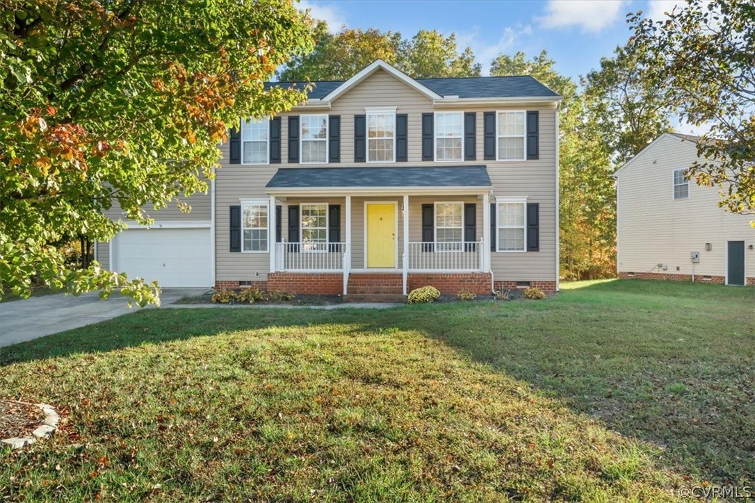 2931 Heather Ridge Drive Henrico, VA 23231 - Photo 1 of 30 a front view of a house with a yard