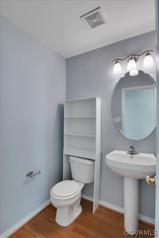 2931 Heather Ridge Drive Henrico, VA 23231 - Photo 13 of 30 a bathroom with a sink toilet and a mirror