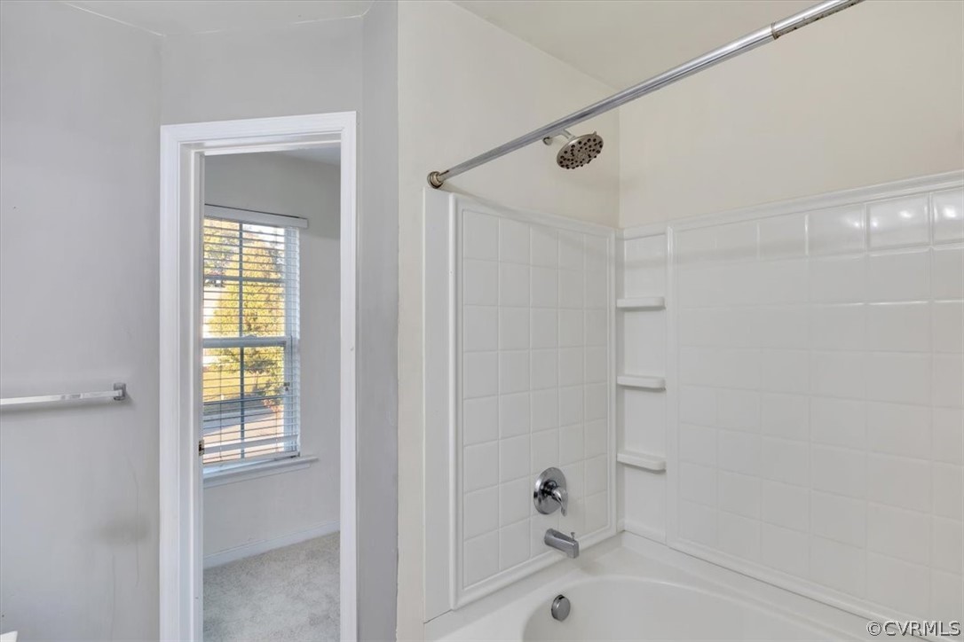 2931 Heather Ridge Drive Henrico, VA 23231 - Photo 19 of 30 a bathroom with a bathtub and a shower