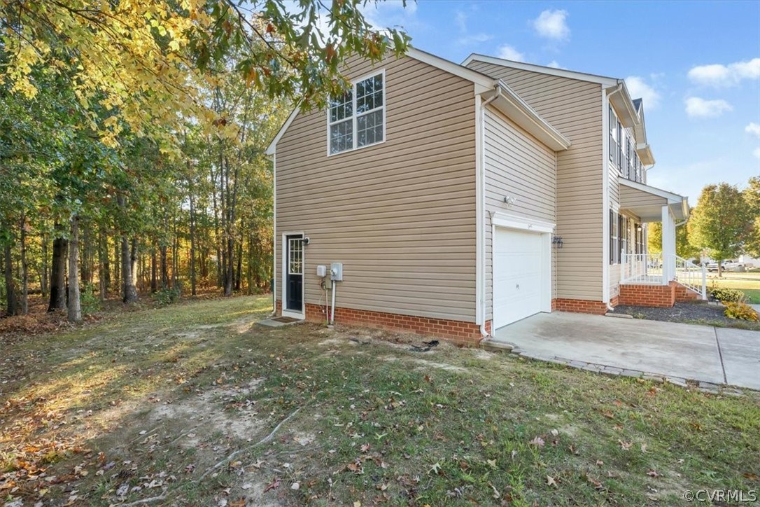 2931 Heather Ridge Drive Henrico, VA 23231 - Photo 29 of 30 a view of a house with a yard