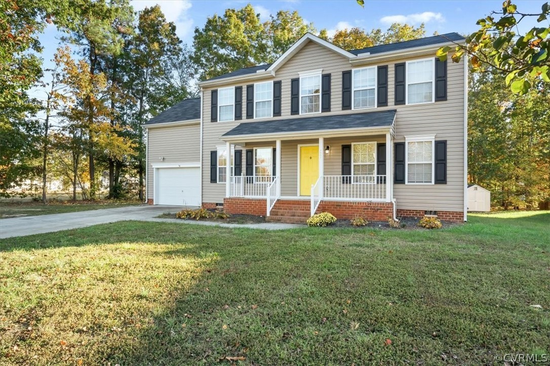 2931 Heather Ridge Drive Henrico, VA 23231 - Photo 3 of 30 a front view of a house with a yard
