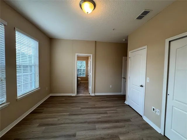 a view of livingroom with wooden floor