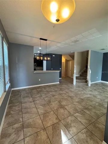 a view of a livingroom with a patio and a fireplace