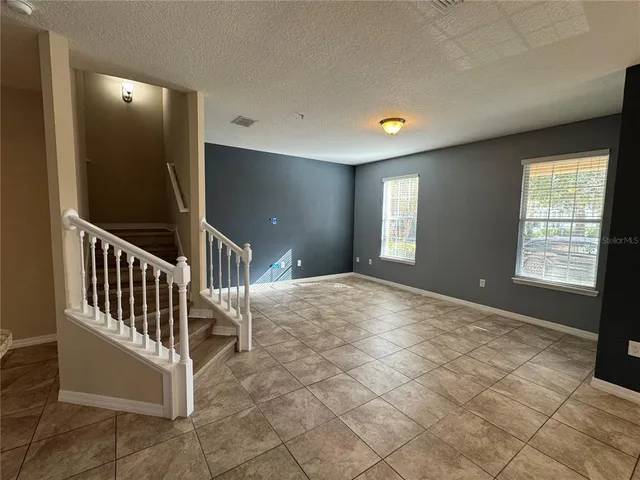 a view of livingroom with stairs and stairs