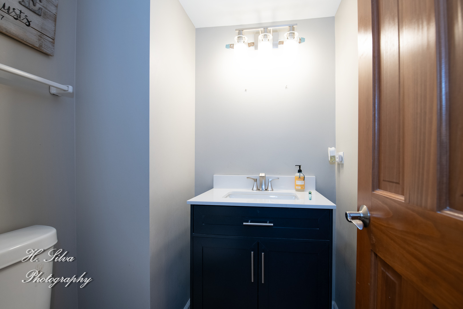 9530 Rainsford Drive Huntley, IL 60142 - Photo 6 of 14 a bathroom with a sink toilet and vanity