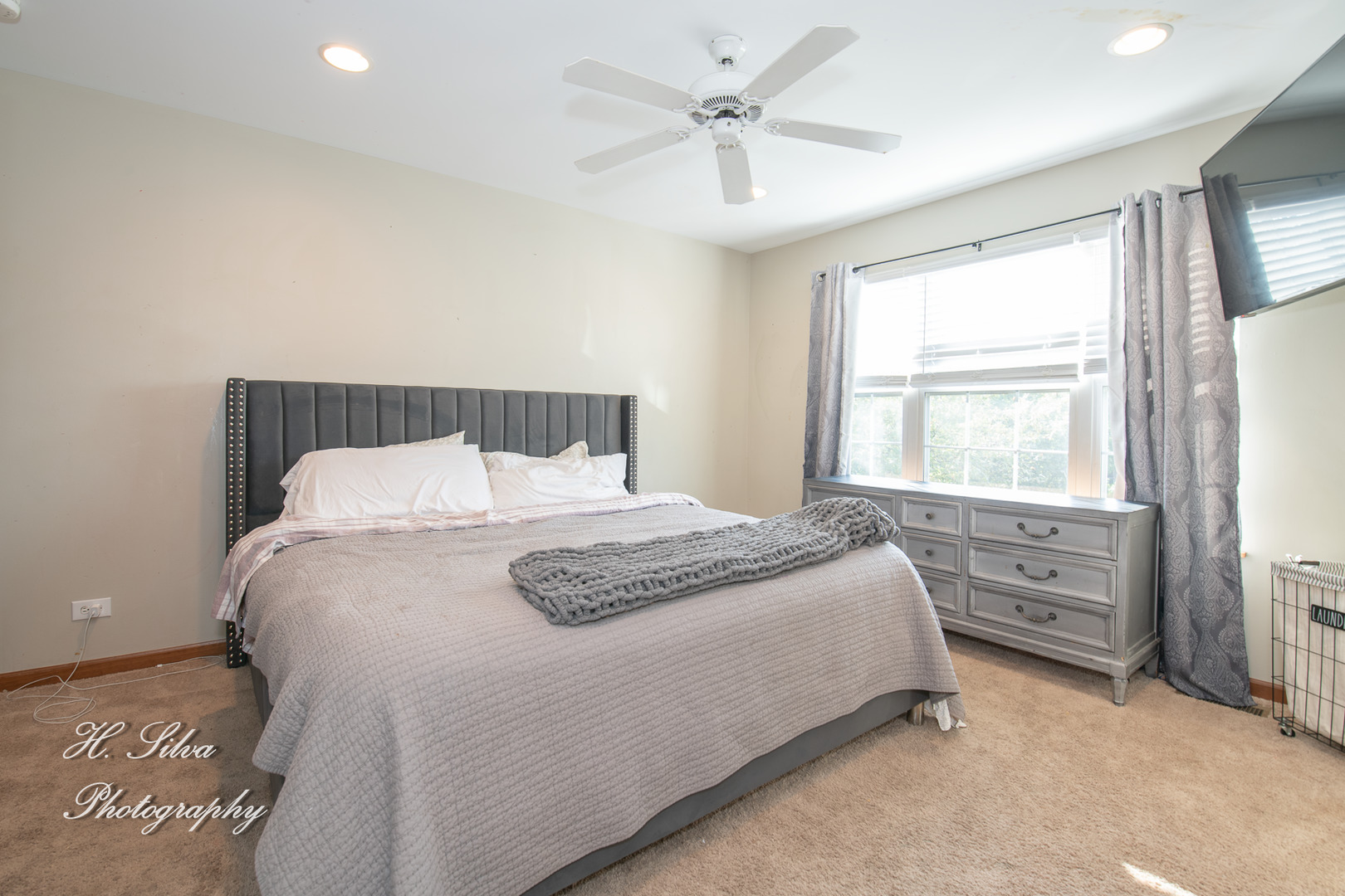 9530 Rainsford Drive Huntley, IL 60142 - Photo 7 of 14 a bedroom with a bed and a window