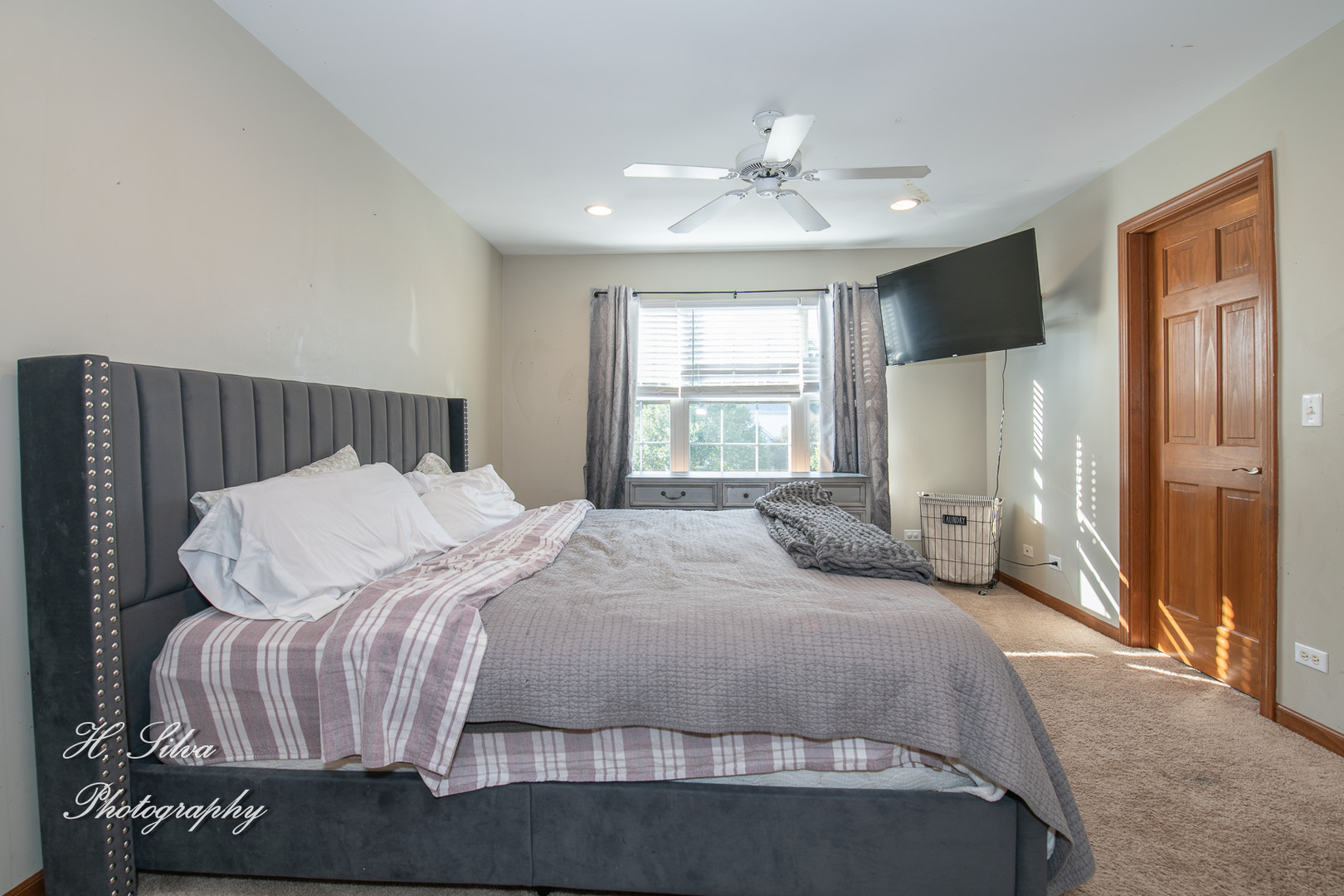 9530 Rainsford Drive Huntley, IL 60142 - Photo 8 of 14 a bedroom with a bed and window