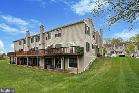 a view of a house with a swimming pool