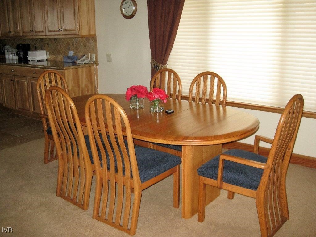 939 Wendy Lane Incline Village, NV 89451 - Photo 14 of 23 a view of a dining room with furniture window and outside view