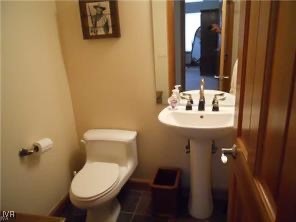 939 Wendy Lane Incline Village, NV 89451 - Photo 19 of 23 a bathroom with a sink toilet and a mirror