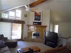 939 Wendy Lane Incline Village, NV 89451 - Photo 22 of 23 a living room with furniture a window and a fireplace