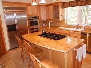 939 Wendy Lane Incline Village, NV 89451 - Photo 23 of 23 a kitchen with stainless steel appliances a stove a sink and a refrigerator