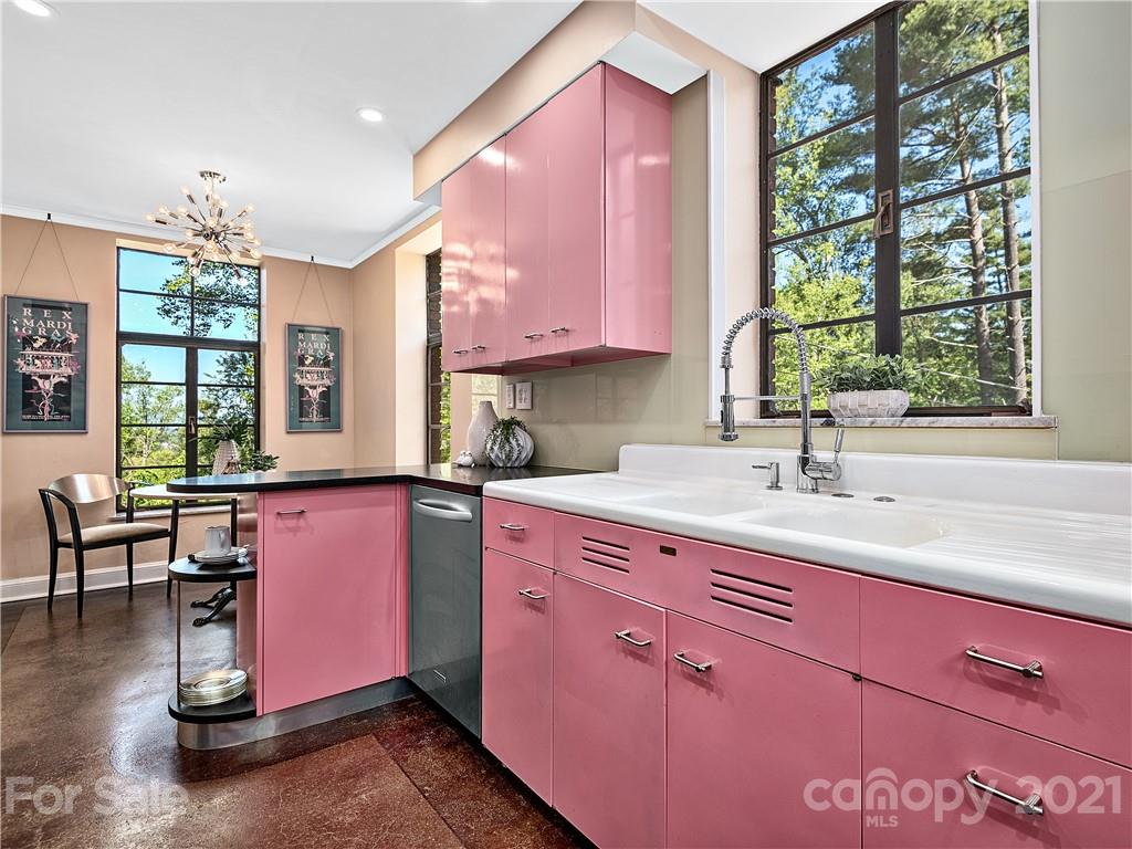 930 Country Club Road Asheville, NC 28804 - Photo 13 of 47 a kitchen with a sink cabinets and window