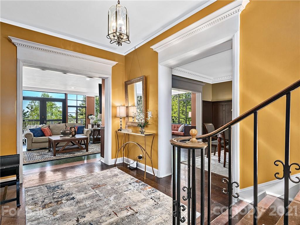 930 Country Club Road Asheville, NC 28804 - Photo 4 of 47 a living room with hardwood floor and furniture