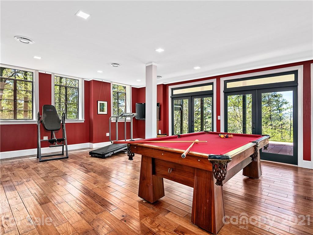 930 Country Club Road Asheville, NC 28804 - Photo 40 of 47 a patio with table and chairs