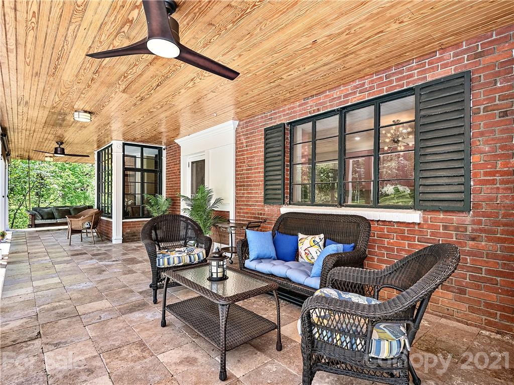930 Country Club Road Asheville, NC 28804 - Photo 42 of 47 a building outdoor space with patio furniture