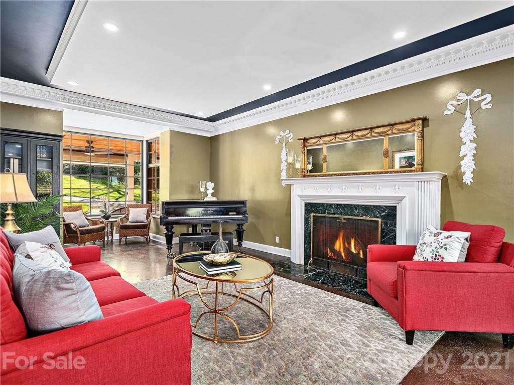 930 Country Club Road Asheville, NC 28804 - Photo 8 of 47 a living room with furniture and a fireplace