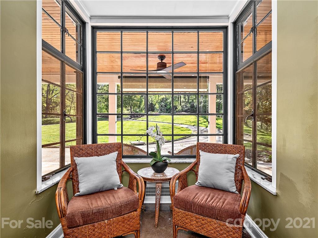 930 Country Club Road Asheville, NC 28804 - Photo 9 of 47 a living room with furniture and a window
