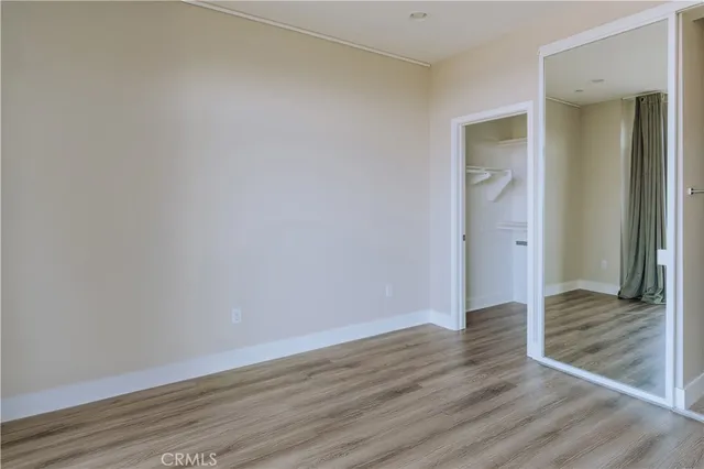 a view of wooden floor and wooden floor in a room