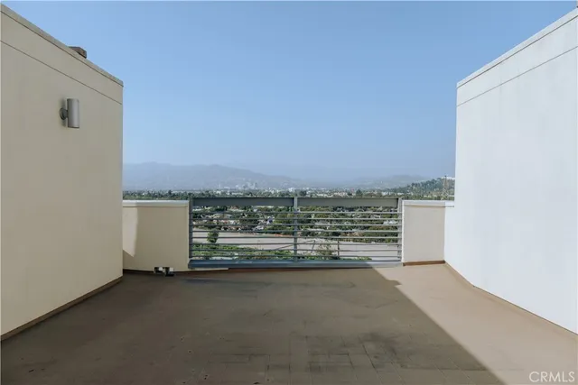a view of a terrace with sky view