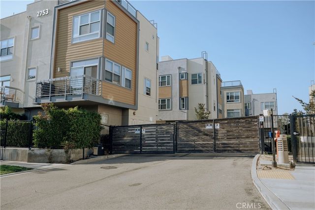 a front view of a building with glass windows