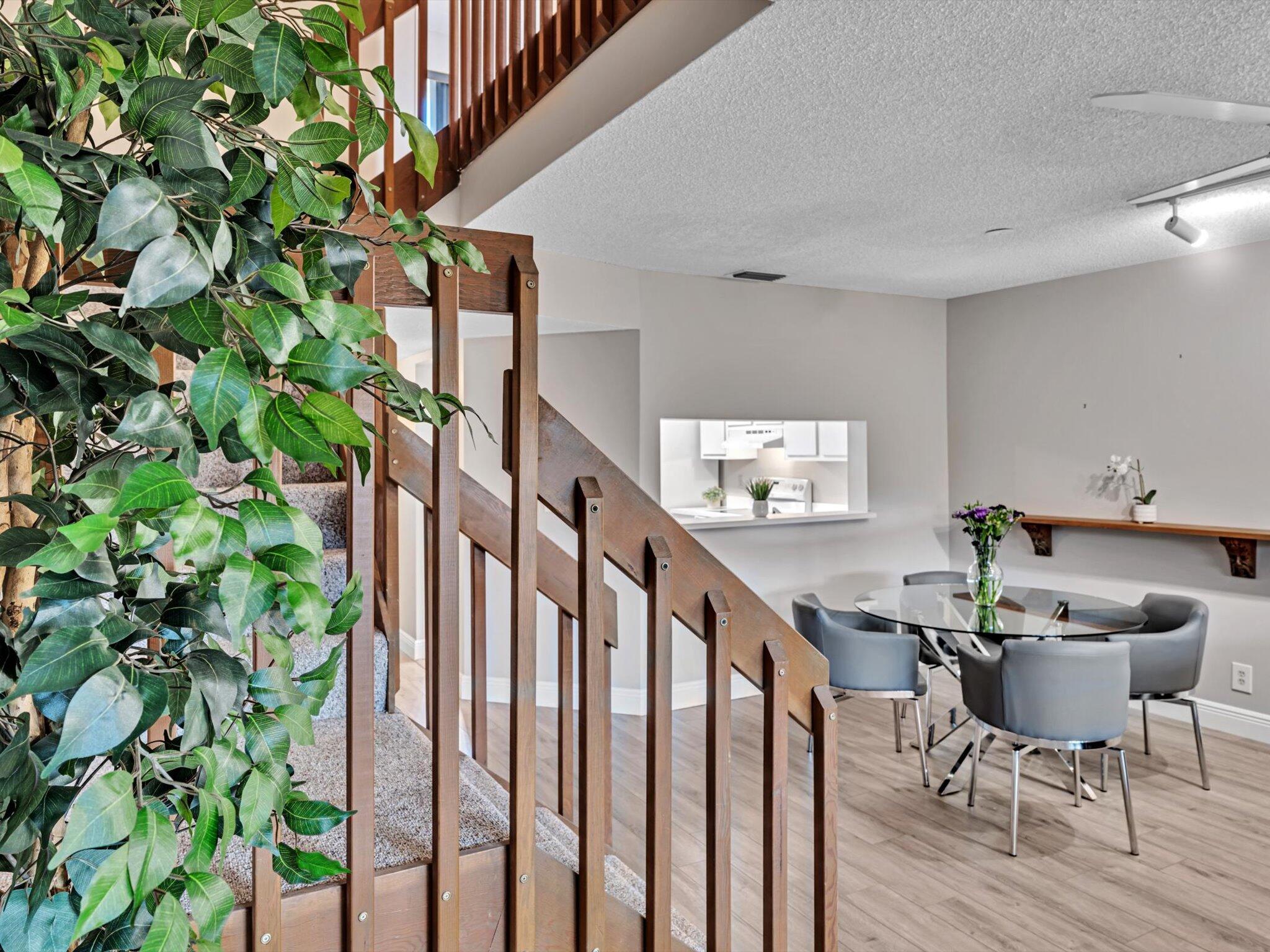 6318 Walk Circle Boca Raton, FL 33433 - Photo 17 of 43 a view of a dining room with furniture and wooden floor