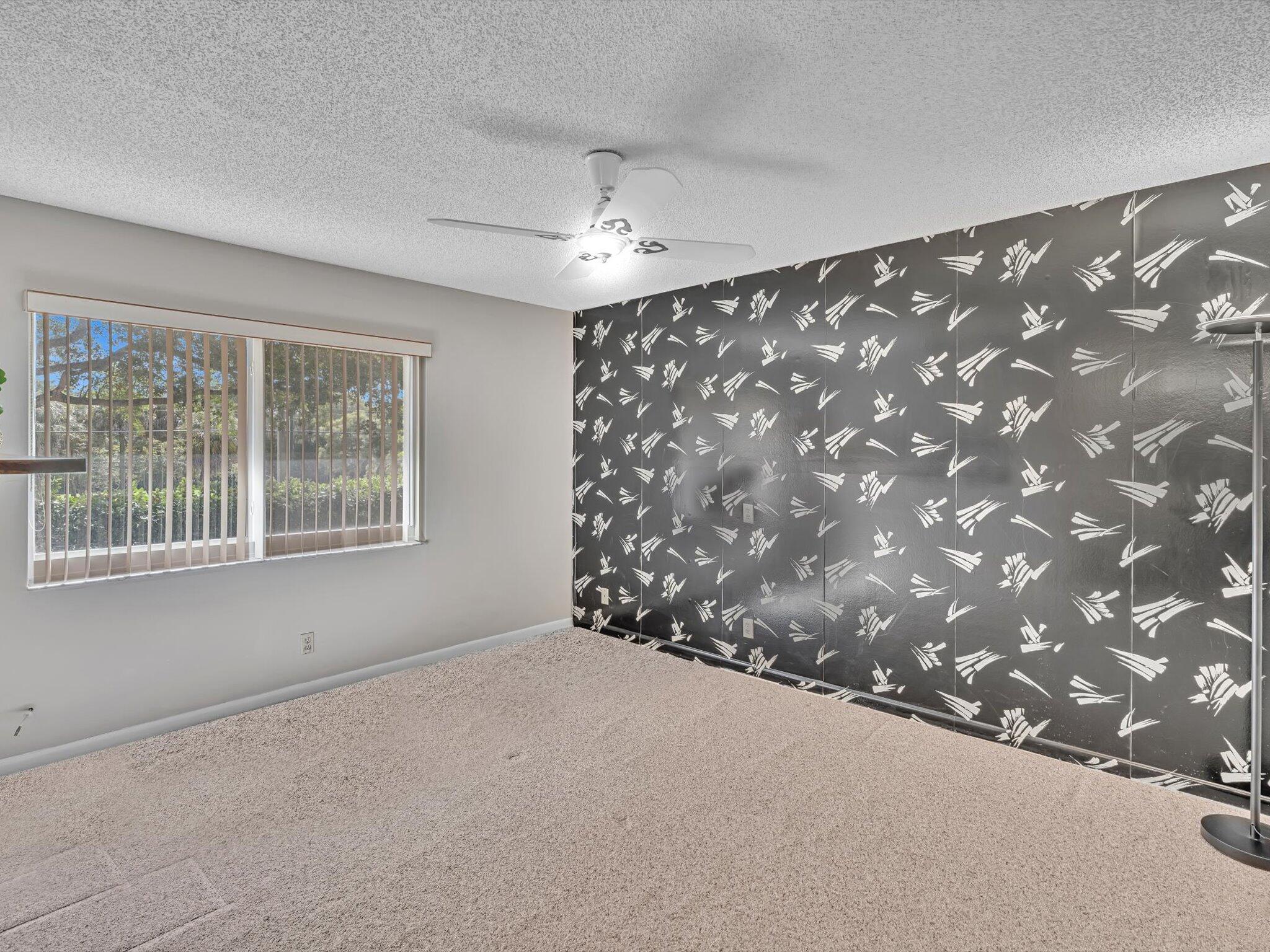 6318 Walk Circle Boca Raton, FL 33433 - Photo 19 of 43 a view of an empty room with a window