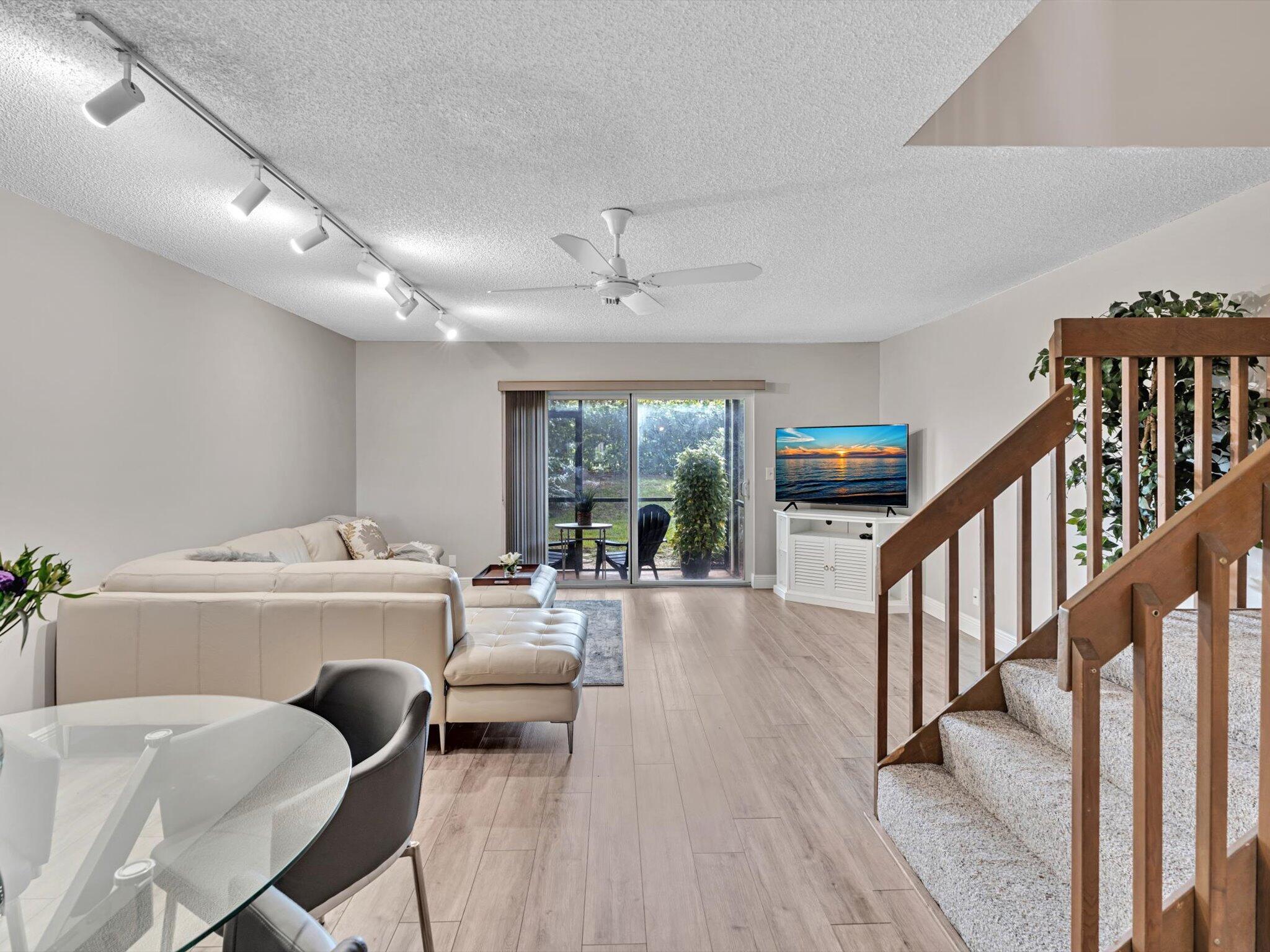 6318 Walk Circle Boca Raton, FL 33433 - Photo 9 of 43 a living room with furniture and a wooden floor