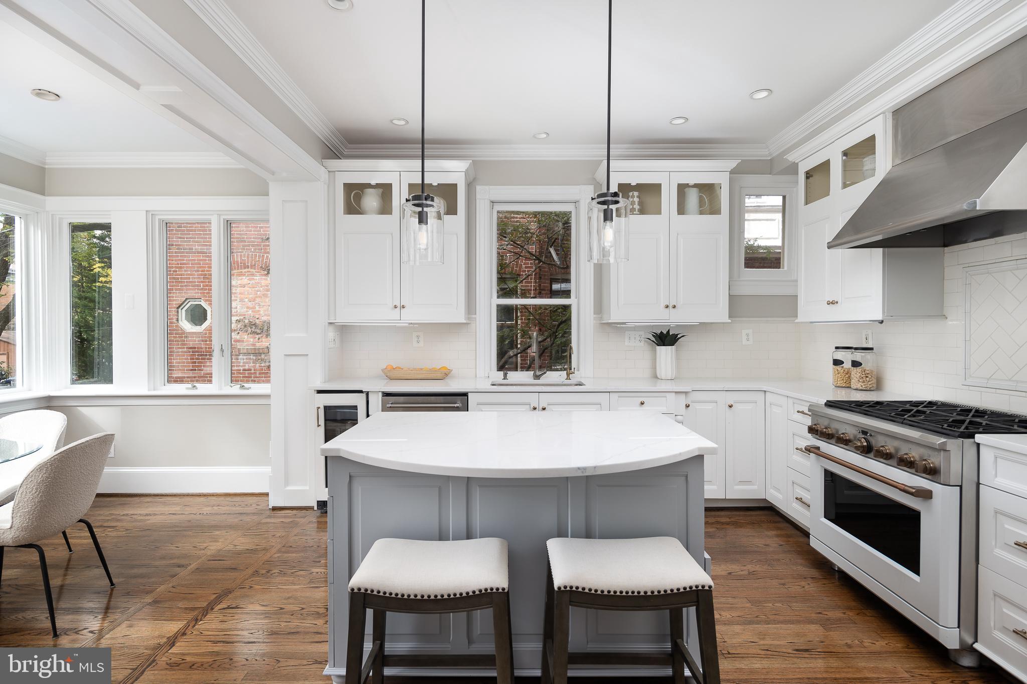 1730 Park Road Northwest Washington, DC 20010 - Photo 18 of 74 Renovated kitchen, pendant lights, wine fridge