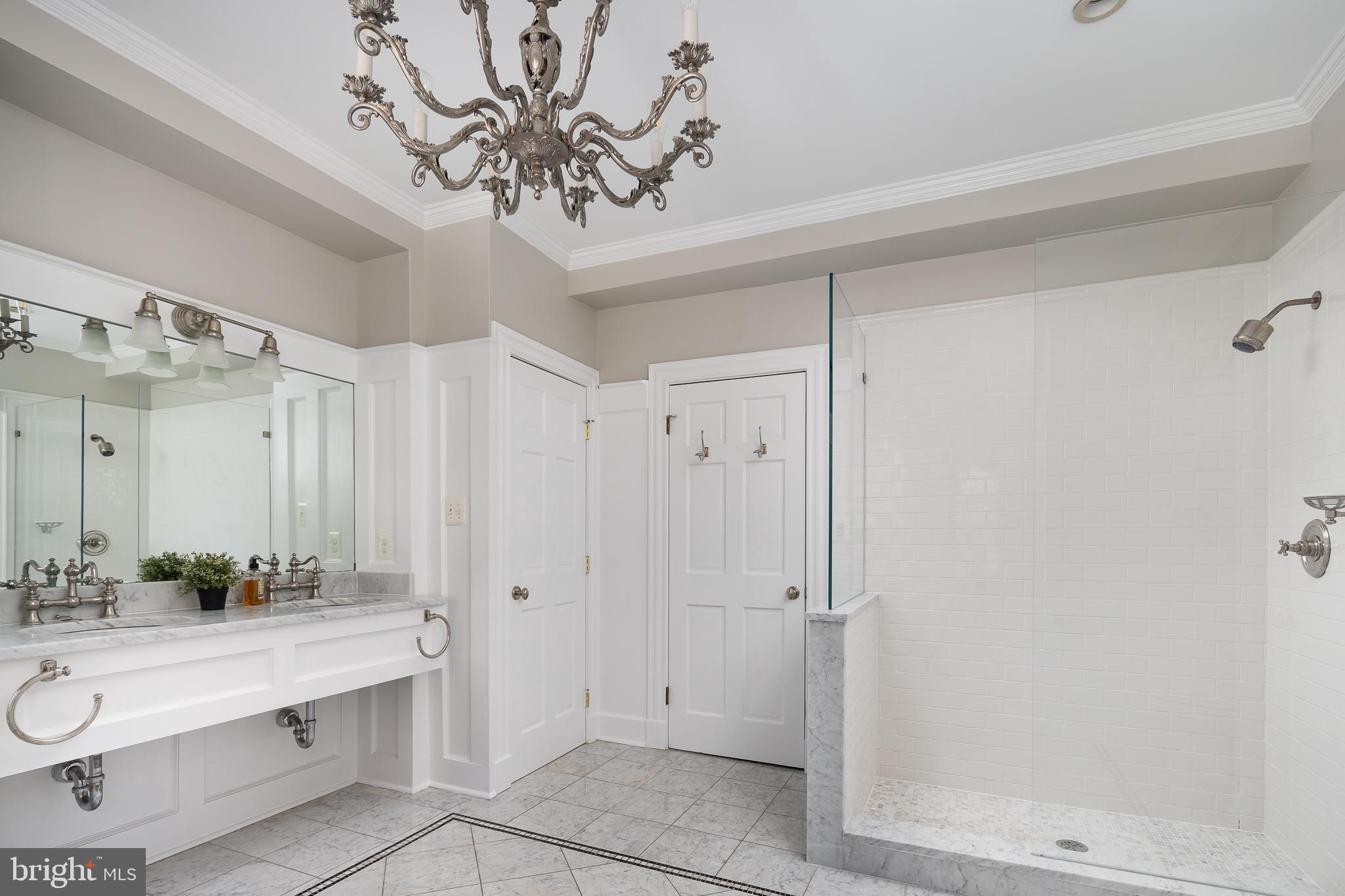 1730 Park Road Northwest Washington, DC 20010 - Photo 26 of 74 Glass shower, chandelier, vanity, carrara marble