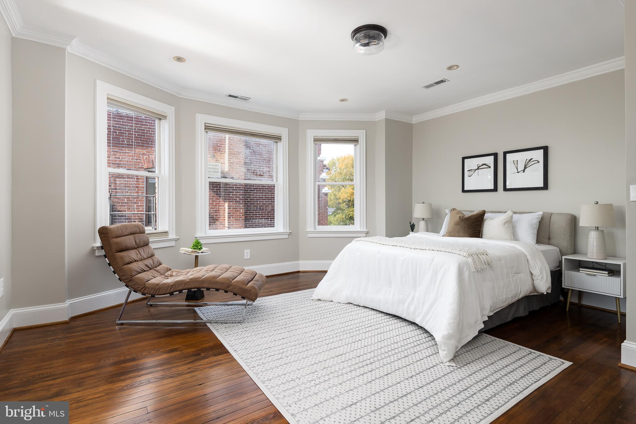 1730 Park Road Northwest Washington, DC 20010 - Photo 42 of 74 Primary bedroom, ensuite, bay window, bright